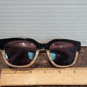 RAEN Black and Gold Frame Sunglasses